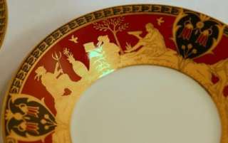 This is a set of 4 dishes with a decorative border of burgundy 
