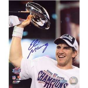 Eli Manning Holding Super Bowl Trophy 8x10  Sports 