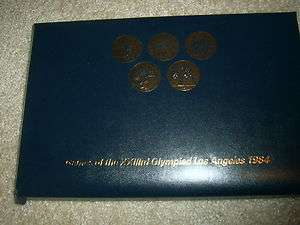 23RD OLYMPICS LOS ANGELES 1984 TRANSIT FARE 24 BRASS TOKENS REPRESENTS 