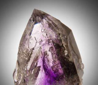 Rare sceptered amethyst crystal with wispy phantoms