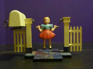 Vintage Celluloid & Bakelite Wind up toy Girl Jumping  