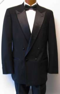 this listing is for a classic black double breasted tuxedo jacket by 
