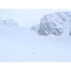  A Group of Back Country Skiers Heading Uphill in Low 