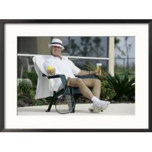 Man Relaxing with a Beer After His Tennis Match Framed Photographic 