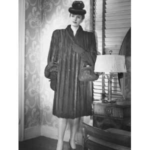  Fashionable Woman in Mink Coat and Hat Standing in Anteroom 