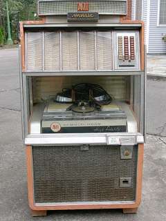 AMI G 200 juke box, serial # 351702   good unrestored 45 rpm machine 