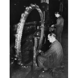  Workers Working on a Gun Turntable in a Munitions Factory 