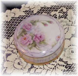 are pink and lavender signed by porcelain artist priscilla cipolletti