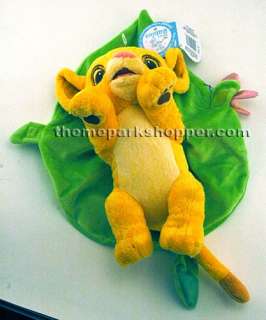 Baby Simba is wrapped in a leaf blanket fastened by a butterfly velcro 