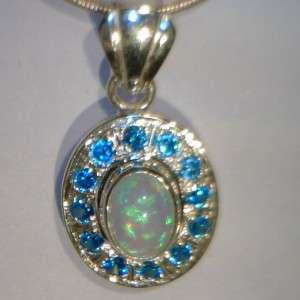 Blue Topaz Halo and Lab Created Opal Cab Handmade Sterling Silver 