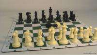 The chess board is a roll up, thick, green and white rubber mat. The 