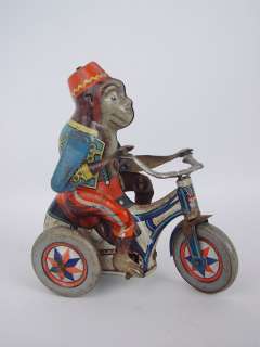 Rare Arnold Germany Bobby Monkey Cyclist Tin Toy Windup  