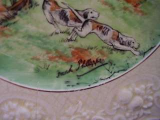 the back is marked crown ducal ware a nice plate