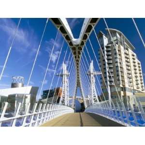 com View Along Pedestrian Suspension Bridge at Salford Quays, Salford 