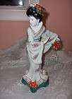 Porcelain Geisha figurine  