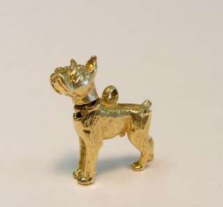 Offered today is this adorable little 14K yellow gold boxer dog charm