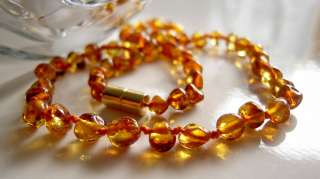   is for the golden honey Baltic amber necklace on a magnetic clasp