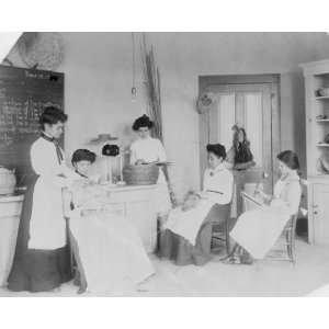   weaving baskets in a classroom at the Tuskegee