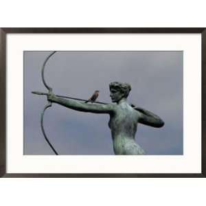  Mockingbird atop a bronze sculpture of Diana by Augustus Saint 